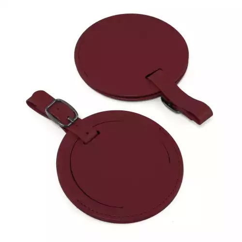 Round Luggage Tag with Flap, in Belluno, a vegan coloured leatherette with a subtle grain.